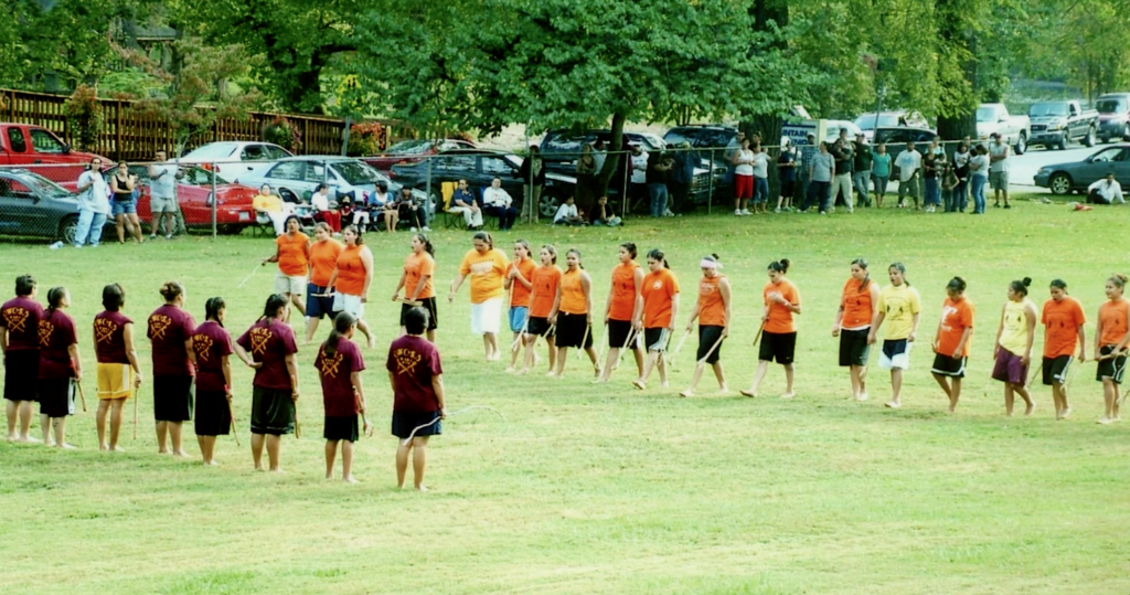Women from the Eastern Band of Cherokee Indians took the field in 2000 to play the traditional game of stickball. Image from the short doc SHE CARRIES ON by director Natalie Welch.