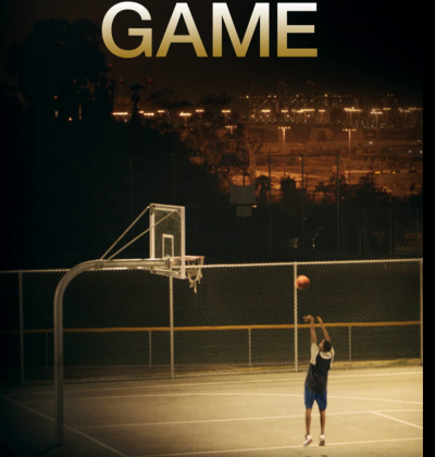 A lone basketball player makes a shot at the local court at night. Film title above image: GAME - Director: Jeannie Donohoe